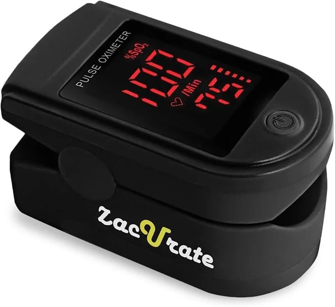 A pulse oximeter displaying a blood oxygen level of 99%, a pulse rate of 75 beats per minute, and a heart rate of 75.