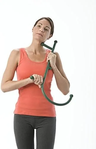 Woman holding product, standing against a white background.