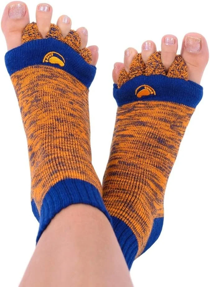 Person wearing orange and blue fingerless socks with toes exposed, with painted nails.