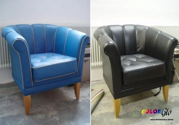 Comparison of two upholstered armchairs, one in blue and the other in black, both with wooden legs, placed indoors on a concrete floor.