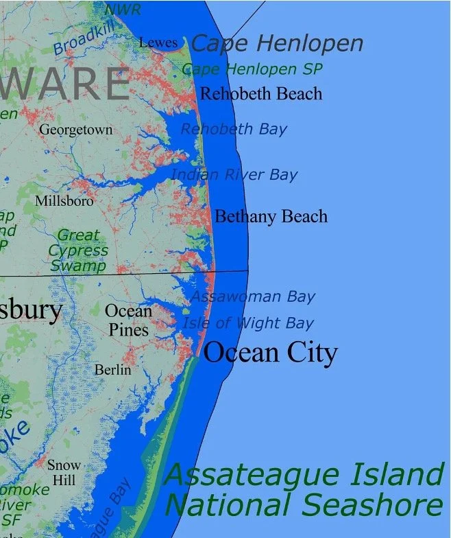Map of a coastal region showing the locations of Cape Henlopen, Rehoboth Beach, Bethany Beach, Ocean City, and Assateague Island National Seashore along the Atlantic Ocean. The map highlights bays, swamps, and towns in the area.