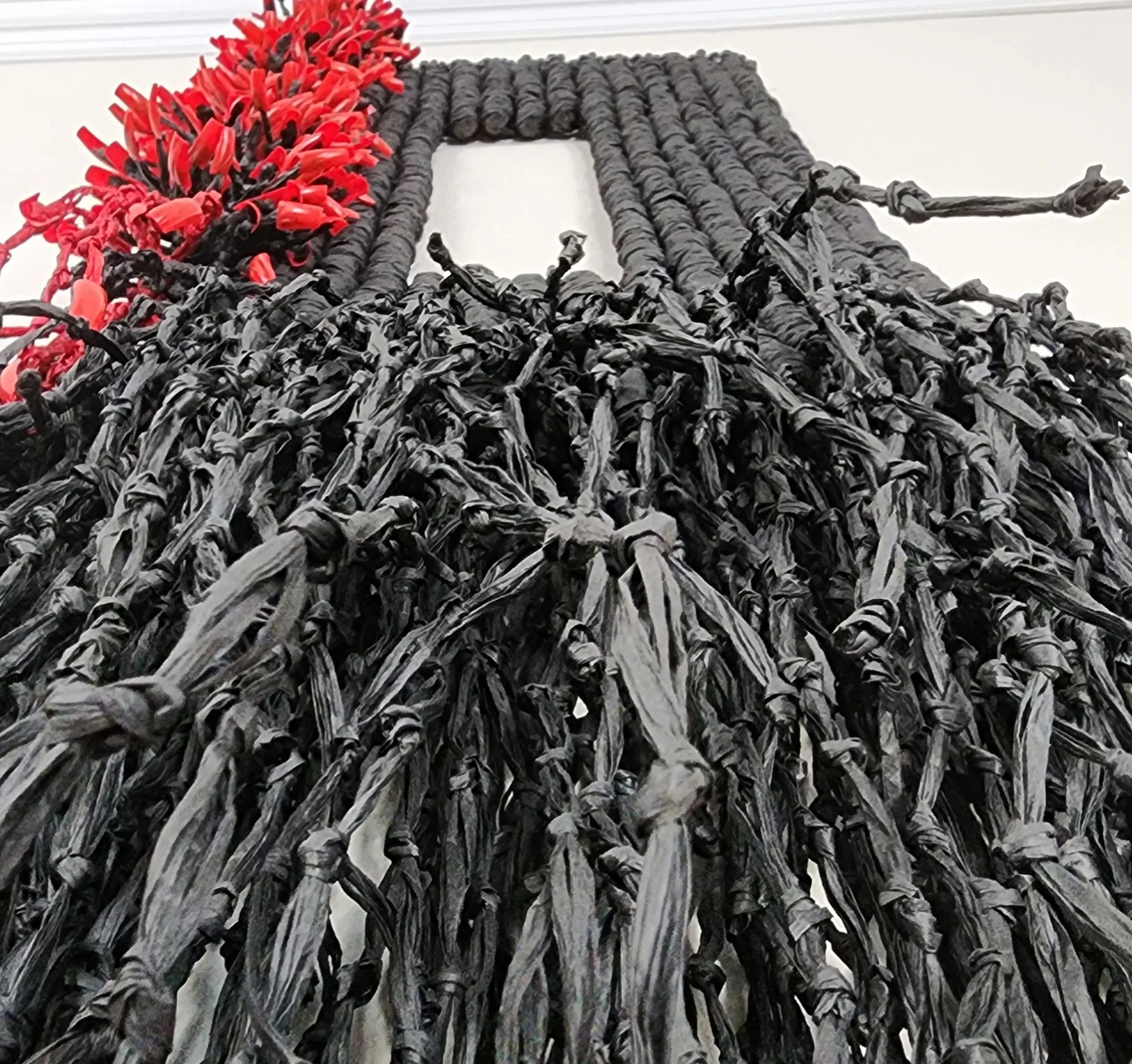 Black and red experimental fiber wall art by OMM Depot