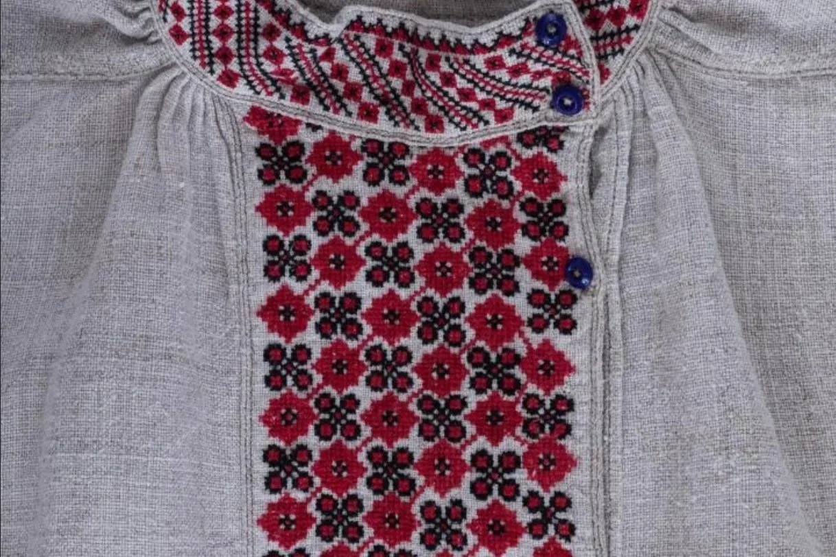 Traditional Ukrainian vyshyvanka with red and black geometric embroidery