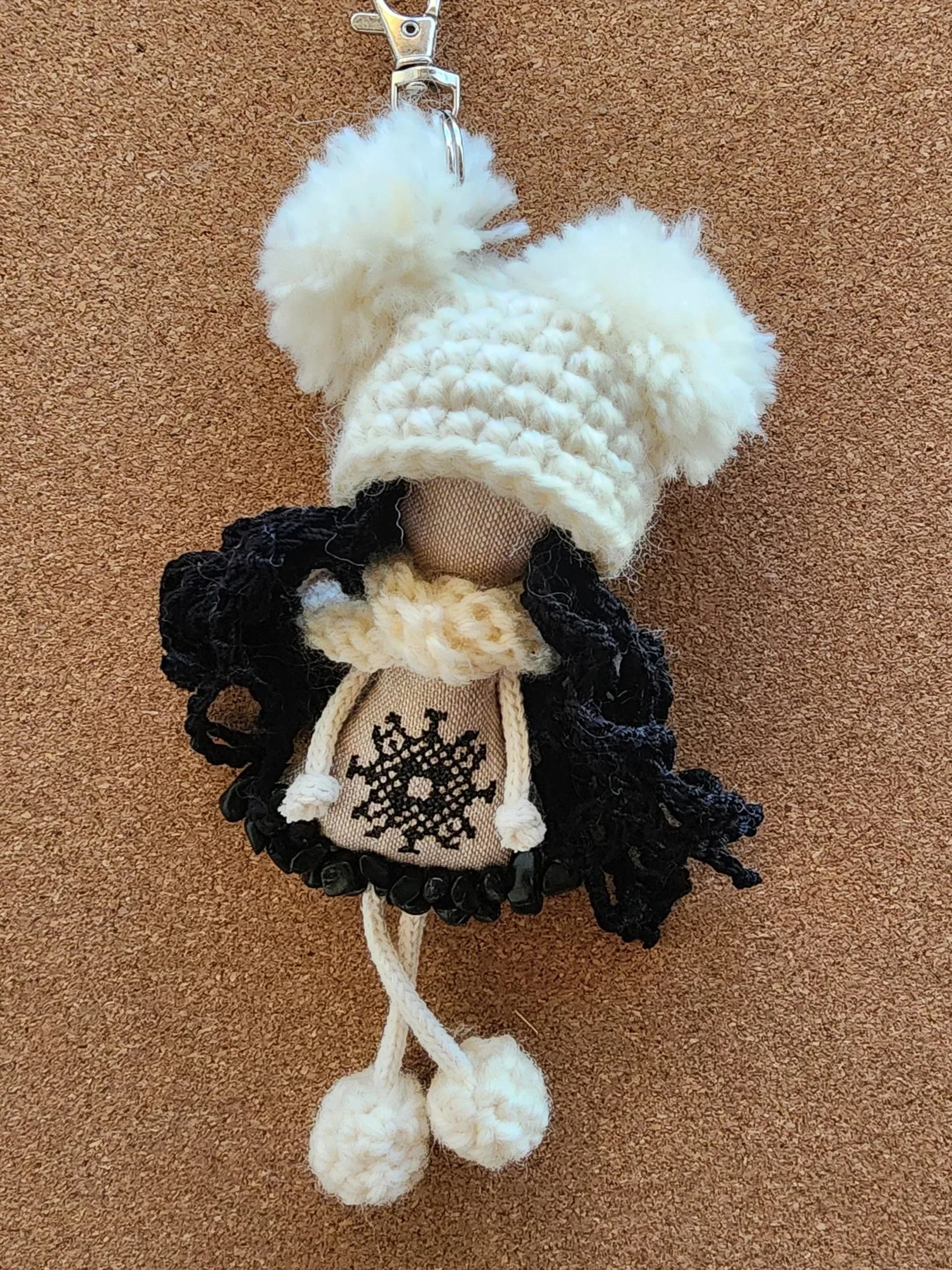 OMmi handmade hanging companion with an embroidered Encoded Intention word ornament