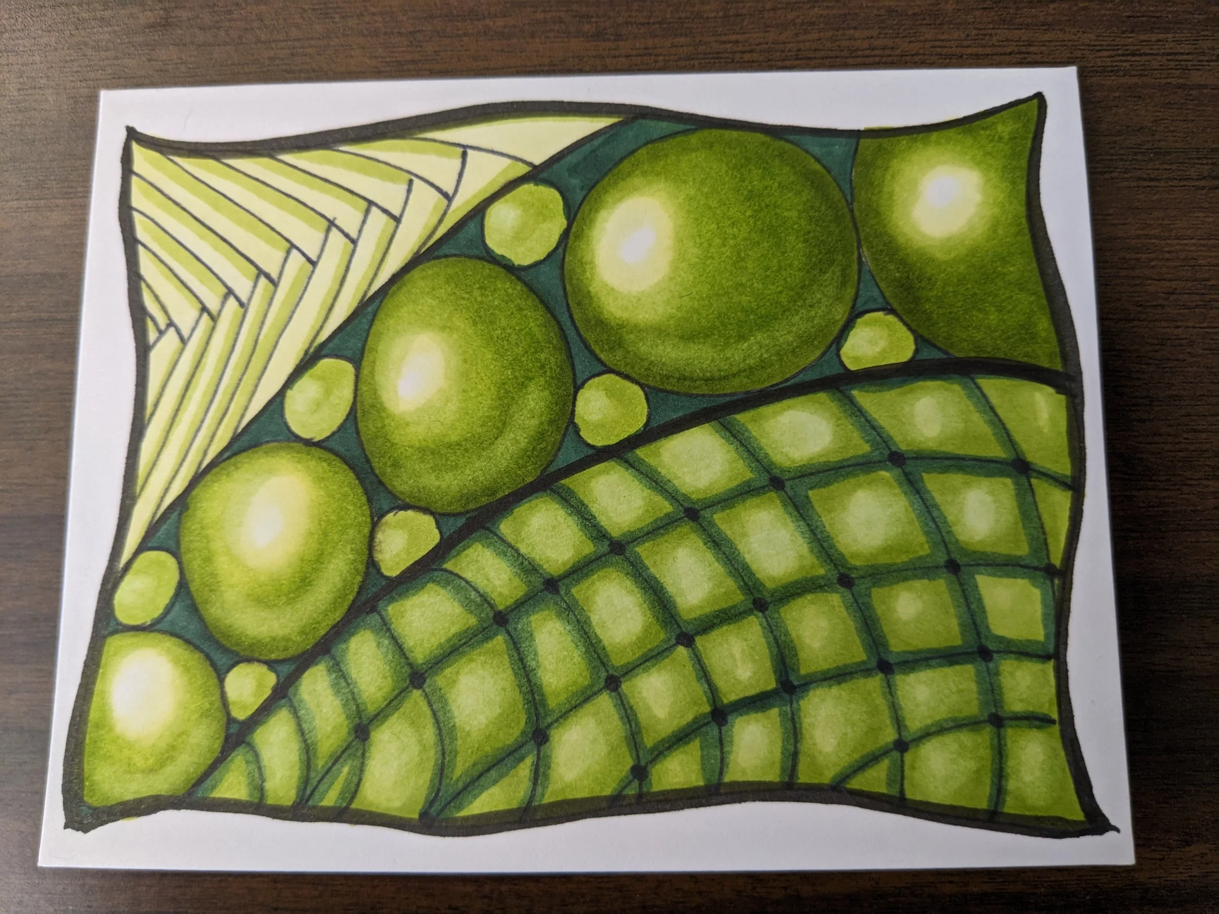 Colorful drawing of green grapes on a vine with leaves, outlined in black.
