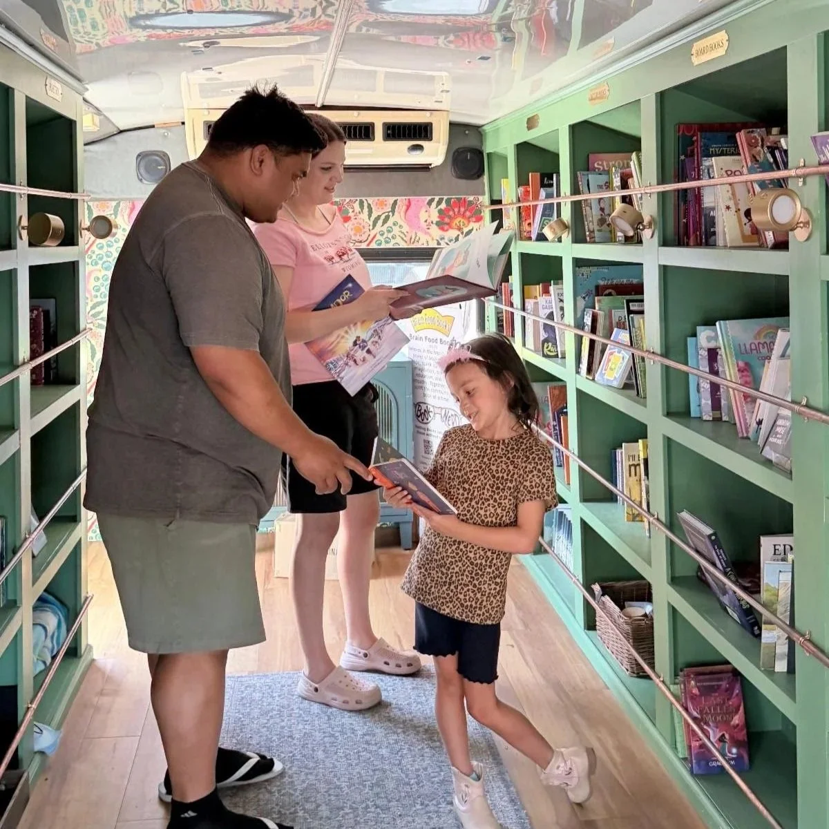 family on book nerd mobile browsing books