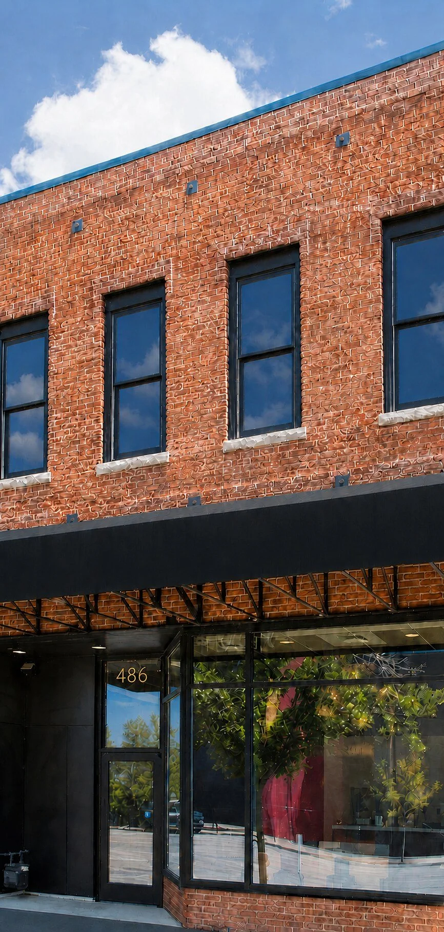486-Front-of-Building-Black-Awning-Web.jpg