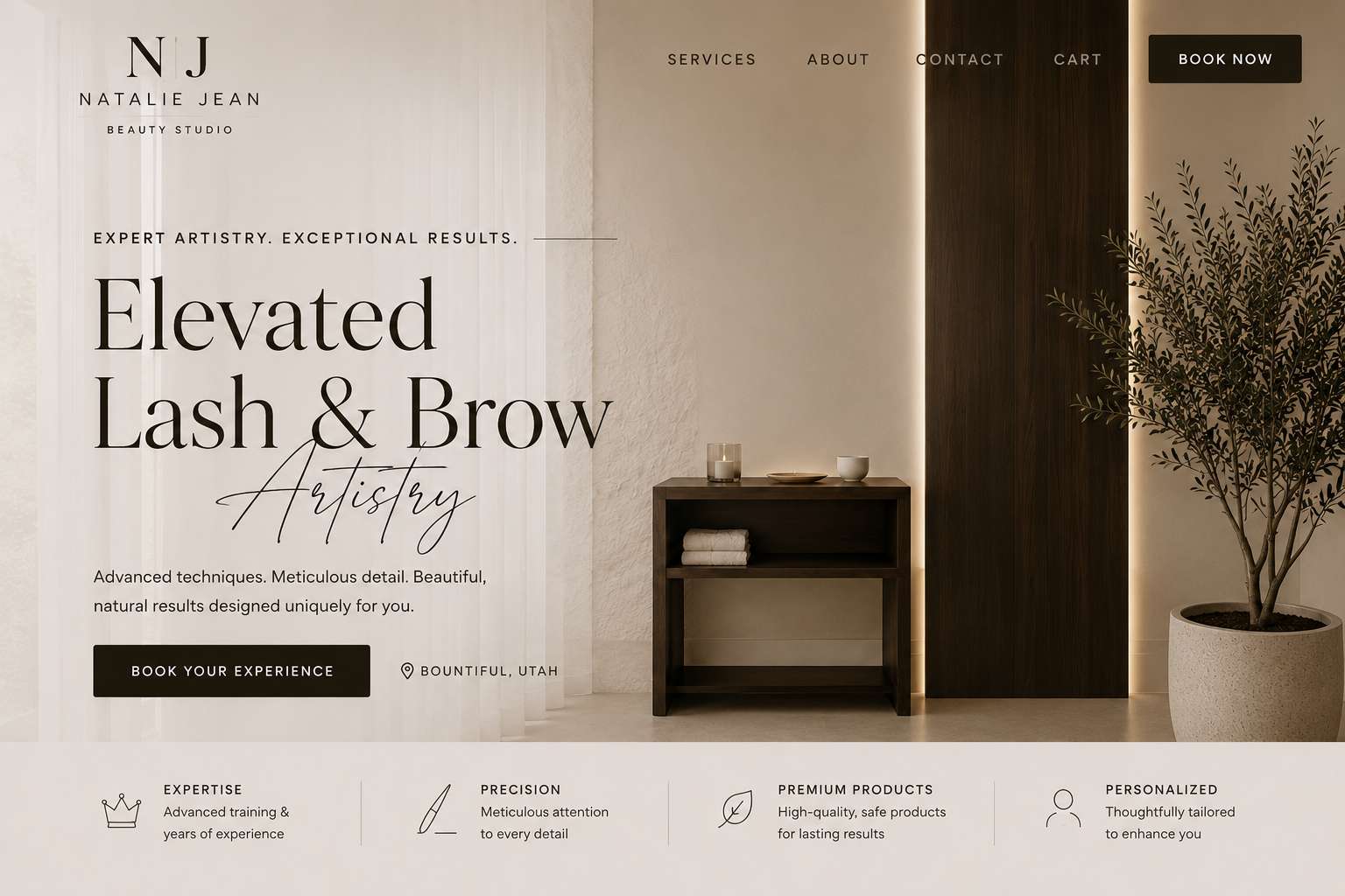 Website homepage for Natalie Jean Beauty Studio, featuring modern minimalistic interior design with a wooden shelf, potted plant, and beach-themed decor. Navigation menu includes Services, About, Contact, Cart, and Book Now button.