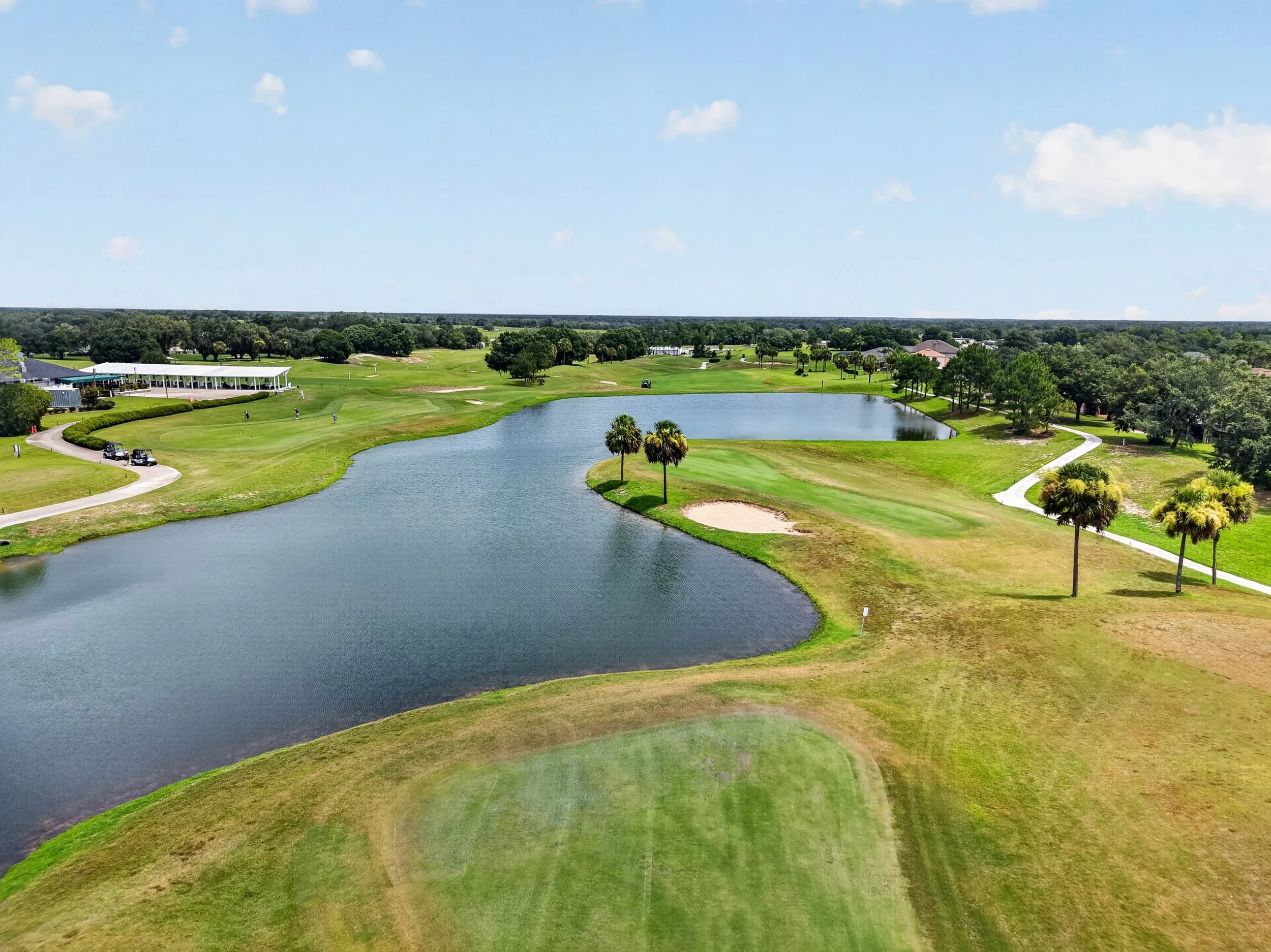 view of pond on golf course