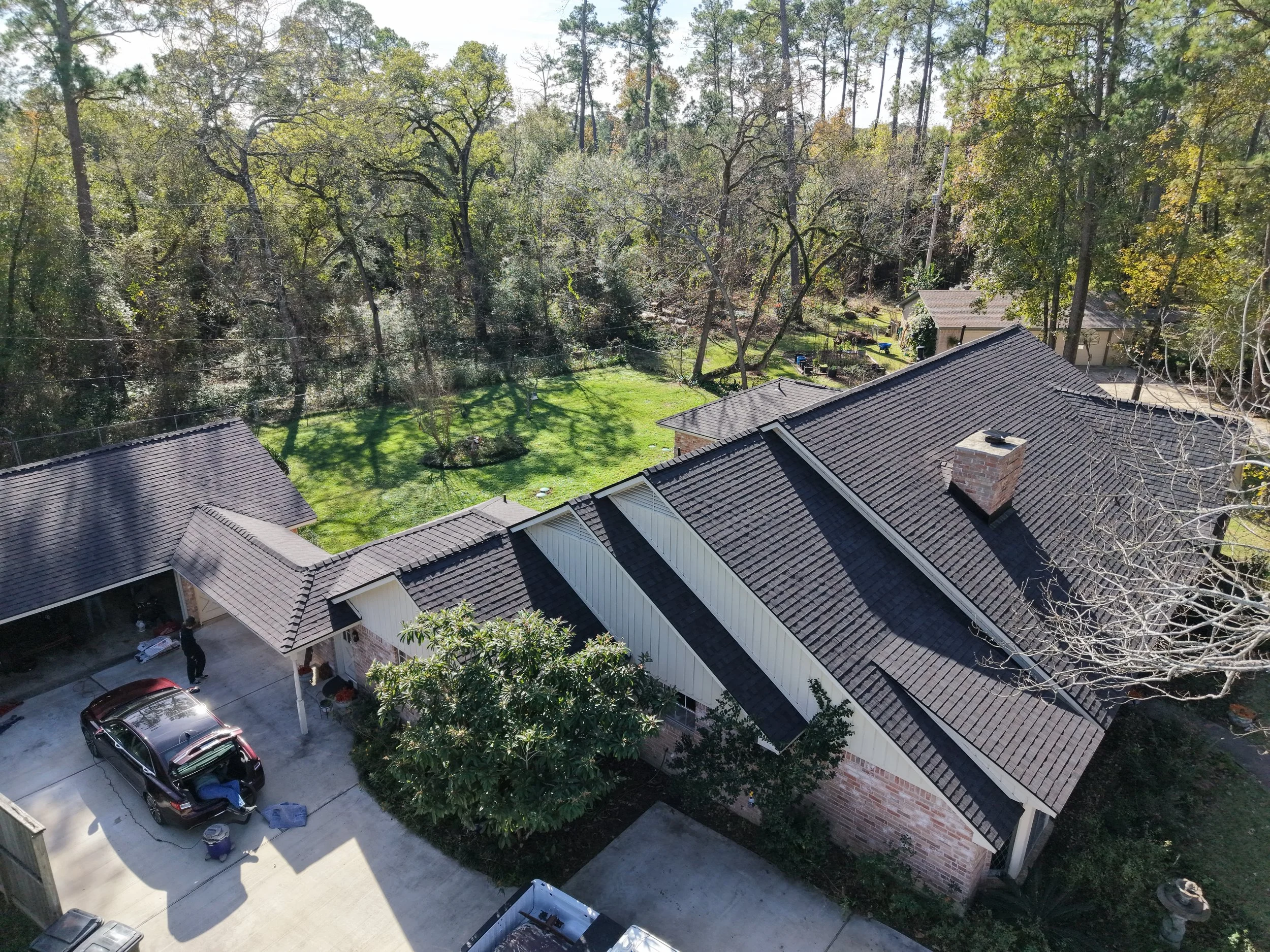 TurnKey Roofing & Restoration — An aerial view of a newly shingled roof in Houston, Texas, using Owens Corning Shingles.