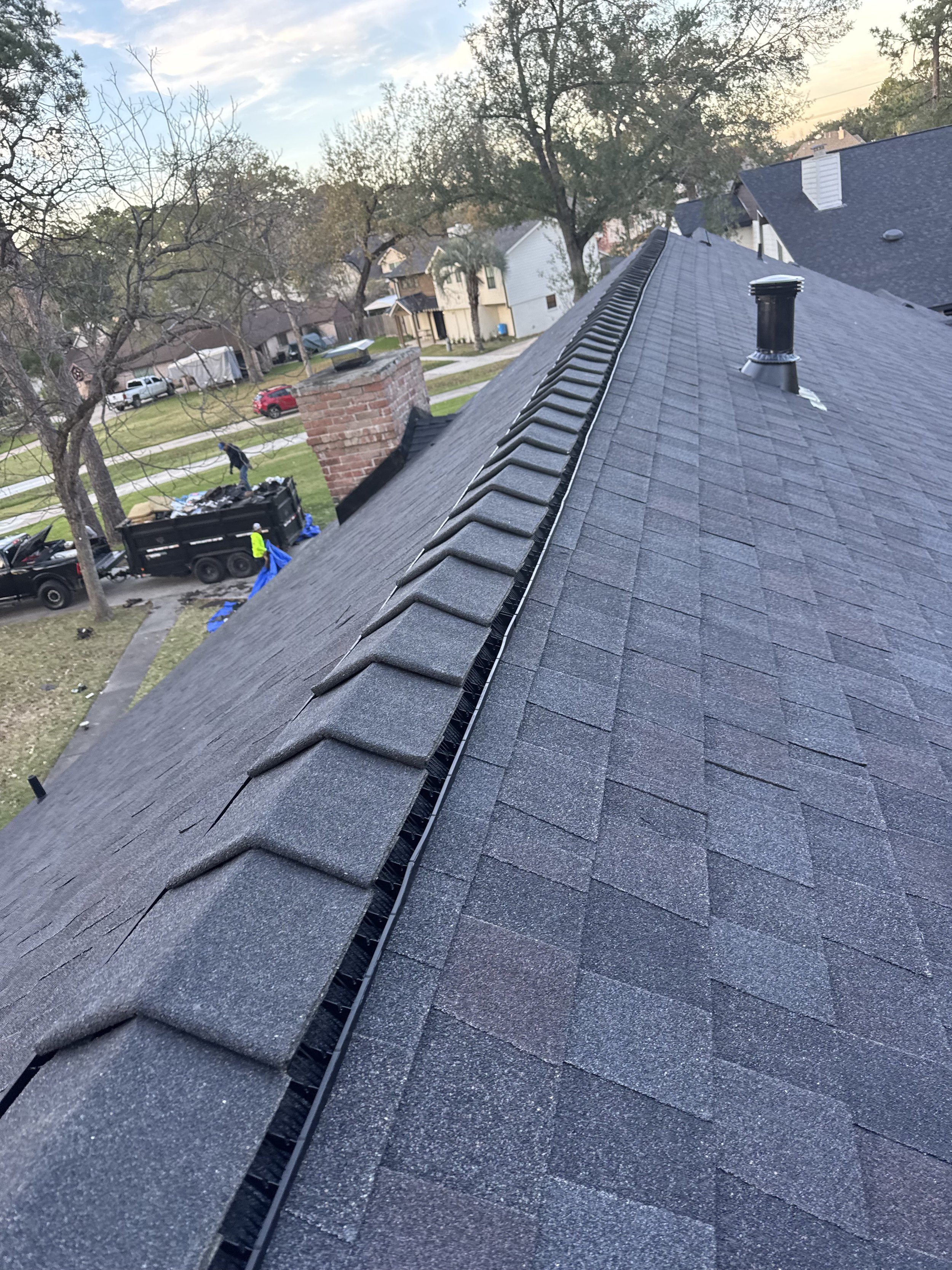 TurnKey Roofing & Restoration — A close-up view of a newly shingled roof in Houston, Texas, using Owens Corning Shingles.