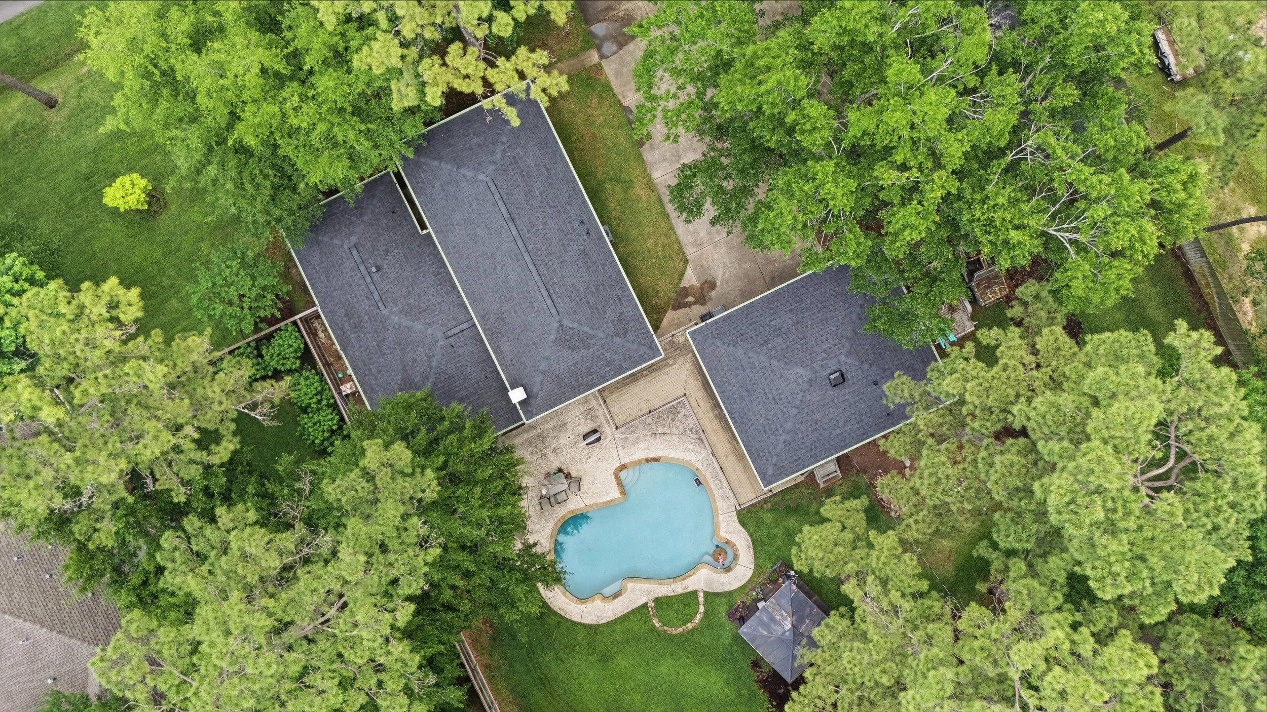 TurnKey Roofing & Restoration — An aerial view of a newly shingled roof in Cypress (Houston), Texas, using Owens Corning Shingles.