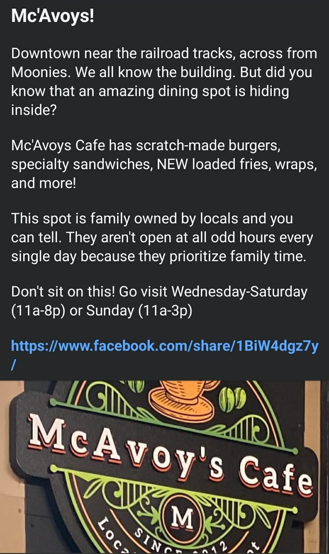 Sign for McAvoy's Cafe with text about its location, menu, family ownership, hours, and a link to Facebook.
