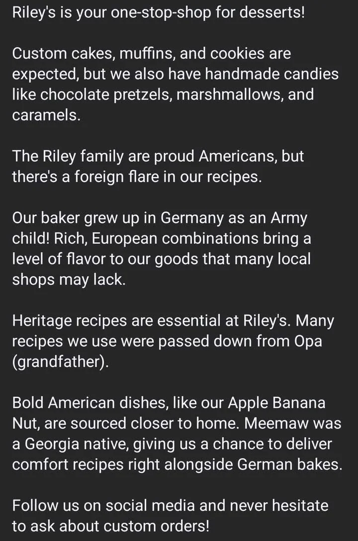 Text from a bakery sign or menu describing Riley's as a one-stop-shop for desserts, offering custom cakes, muffins, cookies, handmade candies like chocolate pretzels, marshmallows, and caramels, with a story about the family's German roots and emphasis on heritage recipes and American dishes.