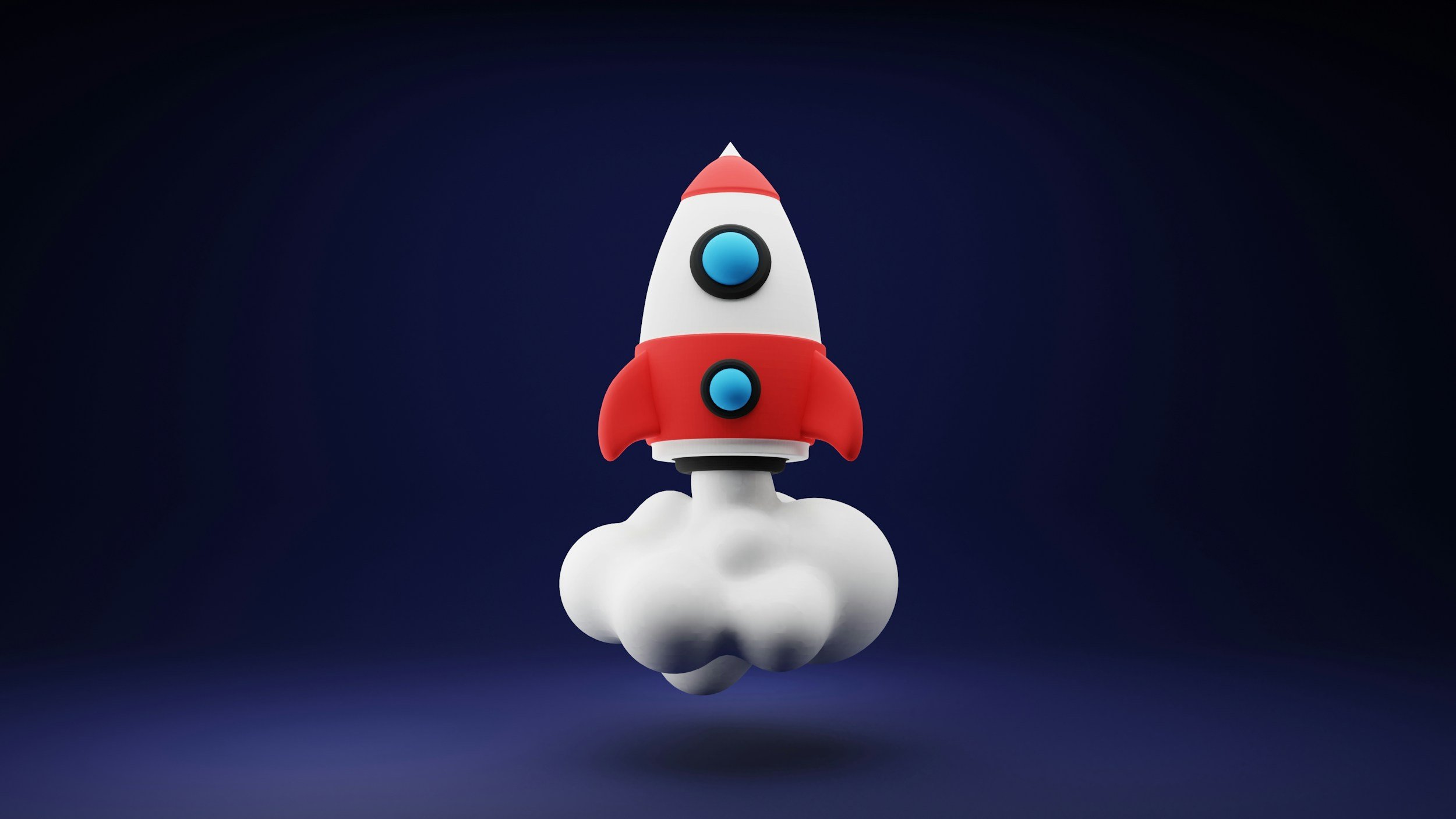 A small cartoon rocket ship with red, white, and blue colors launching from white clouds against a dark blue background.