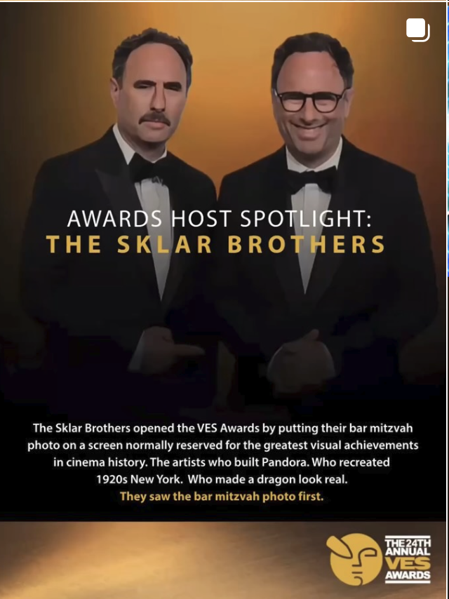 Two men dressed in tuxedos, standing against a yellow background, with the text 'Awards Host Spotlight: The Sklar Brothers'.