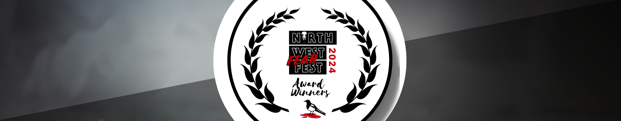 A circular award plaque for the 2024 Northwest Fear Fest, with black laurel branches surrounding the text. The center features the event name, year, and the words 'Award Winners,' along with a stylized bird with a red blood splatter under it.