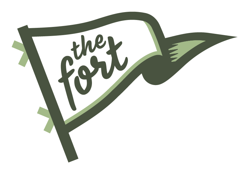 Green and white flag with the text "the fort" written on it.