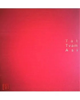 Red book cover with embossed text 'Tat Tvam Asi' on the right side.