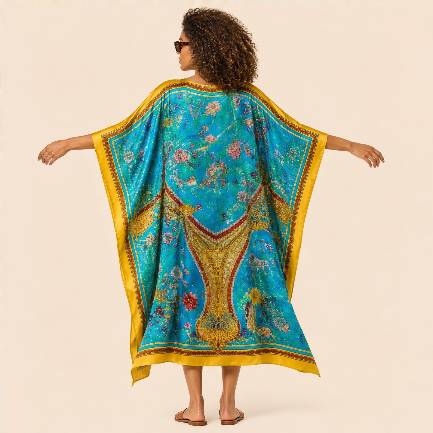 Dawn Bradbury Turquoise Palace long silk kaftan, gilded palace arches and roses on turquoise with a saffron border