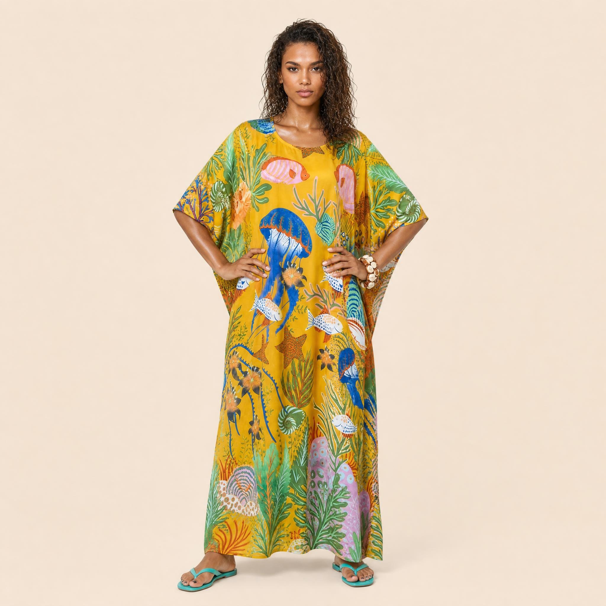 Saffron Reef long silk kaftan in jade and cobalt reef on deep saffron