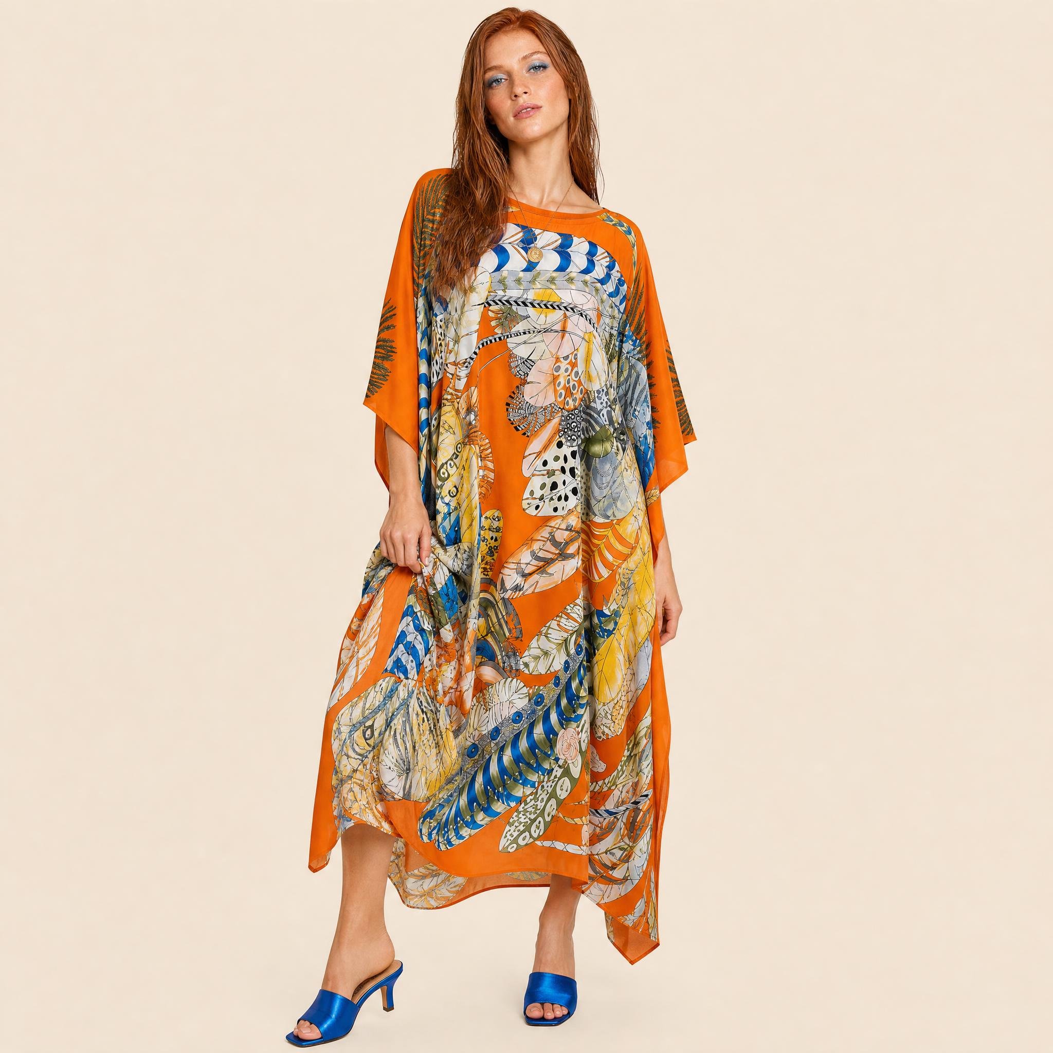 Sunset Plume long silk kaftan in marigold and chartreuse feathers on burnt orange