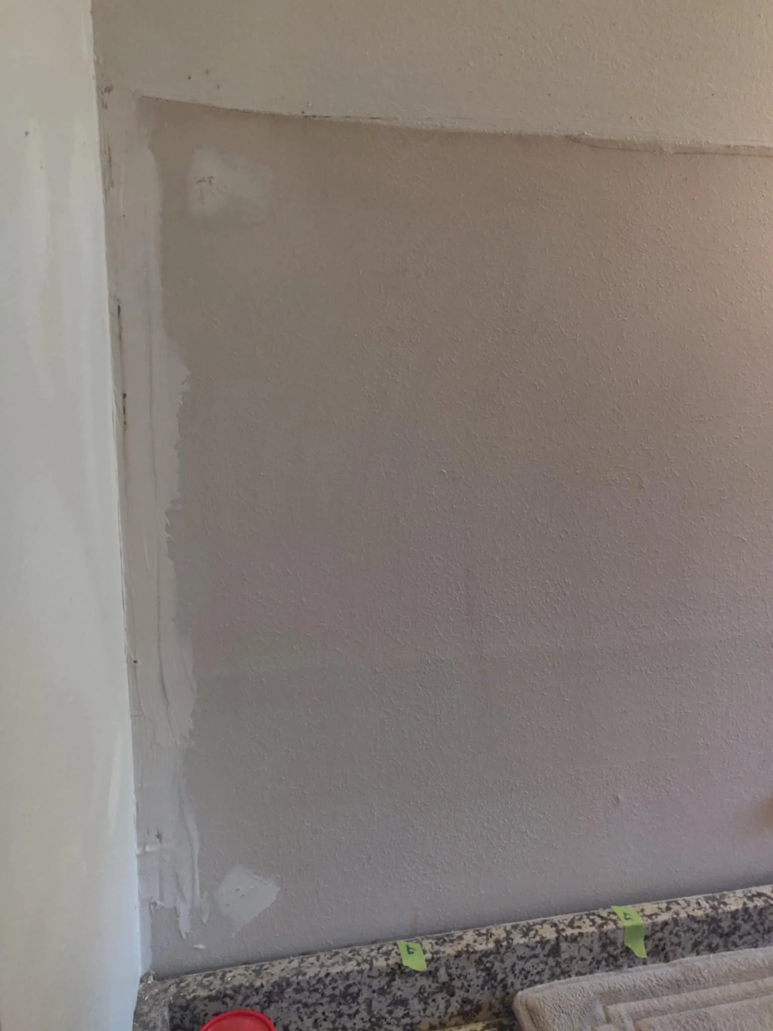 Removing the large mirror and patching the wall