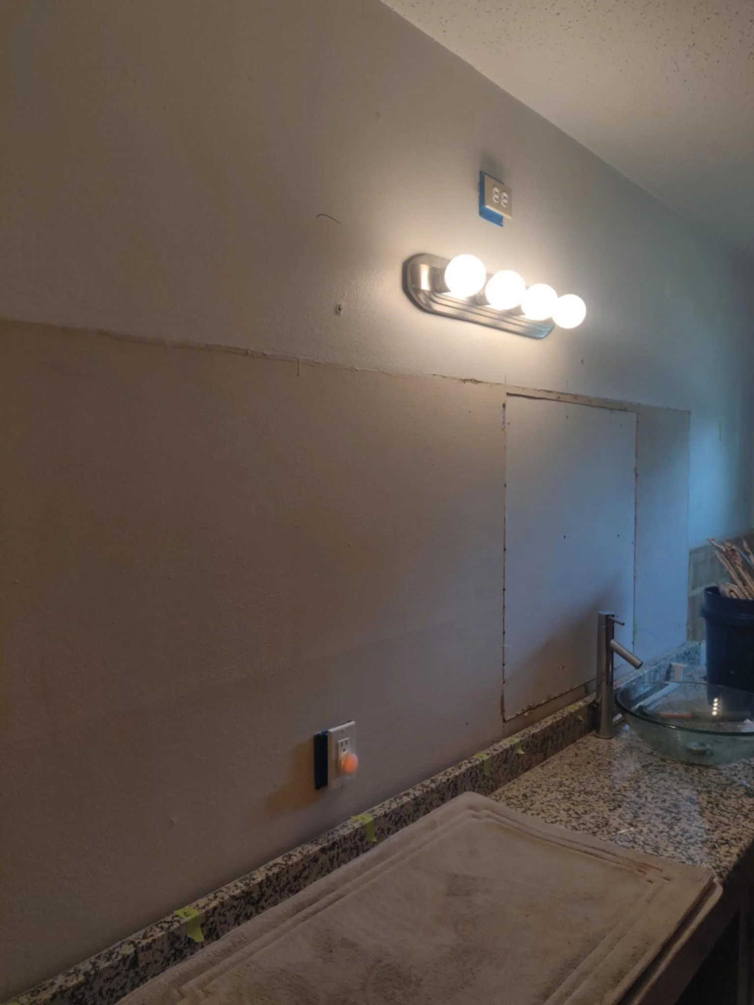 Removing the large mirror and patching the wall