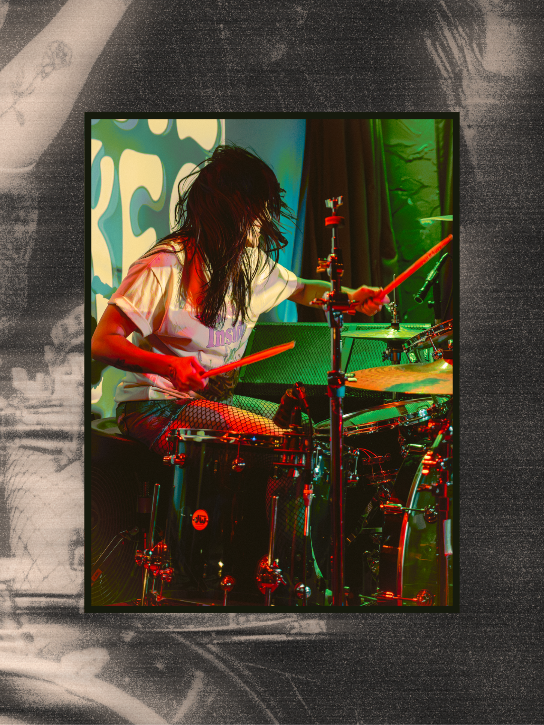 photograph of female drummer live music performance