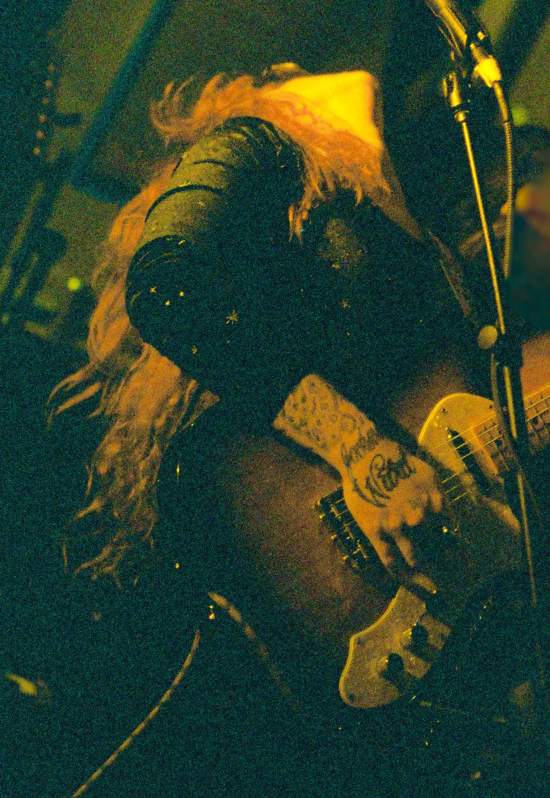 film photograph of guitar being played