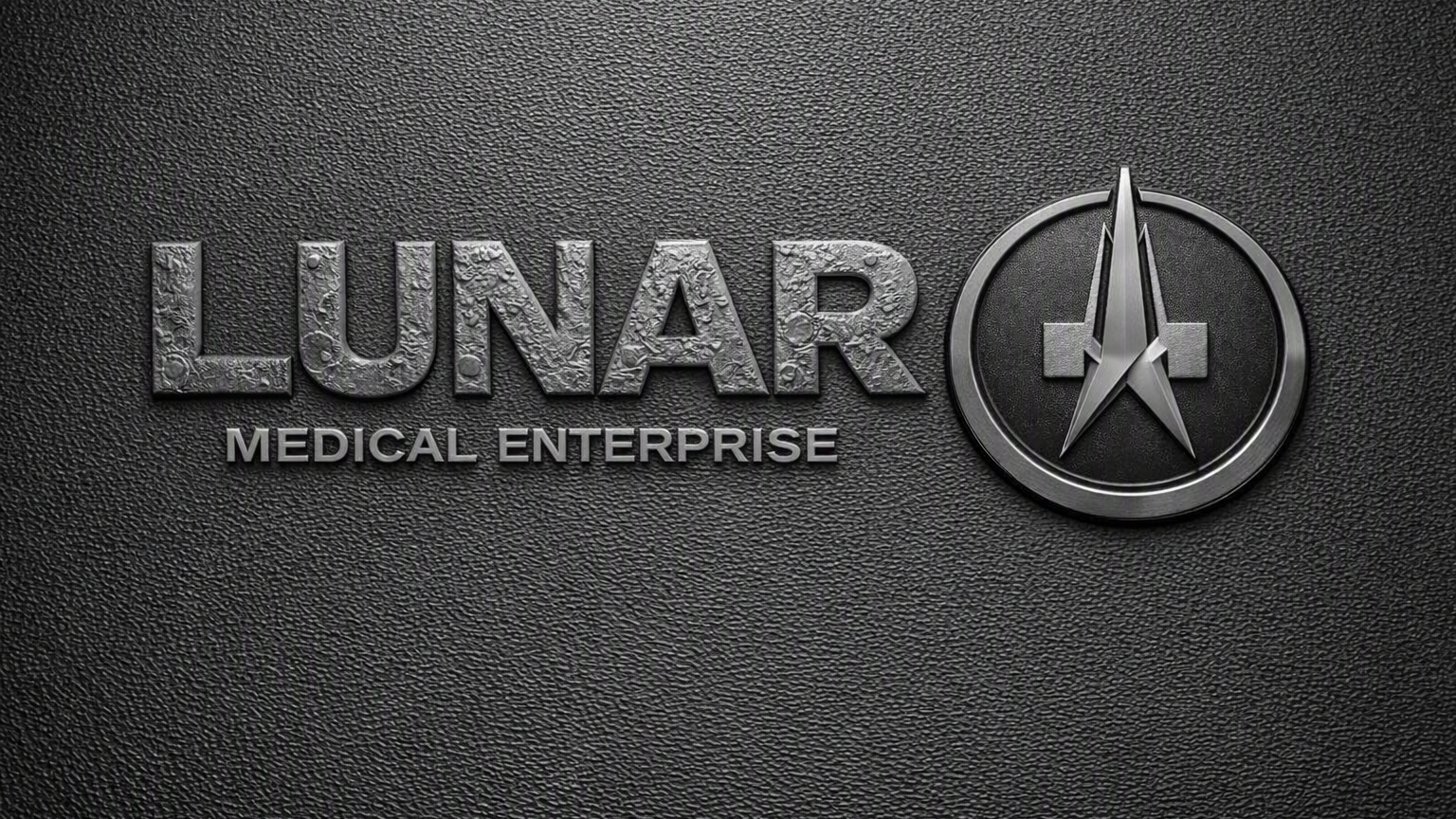 LUNAR Medical Enterprise logo with metallic text and emblem on a dark textured surface.