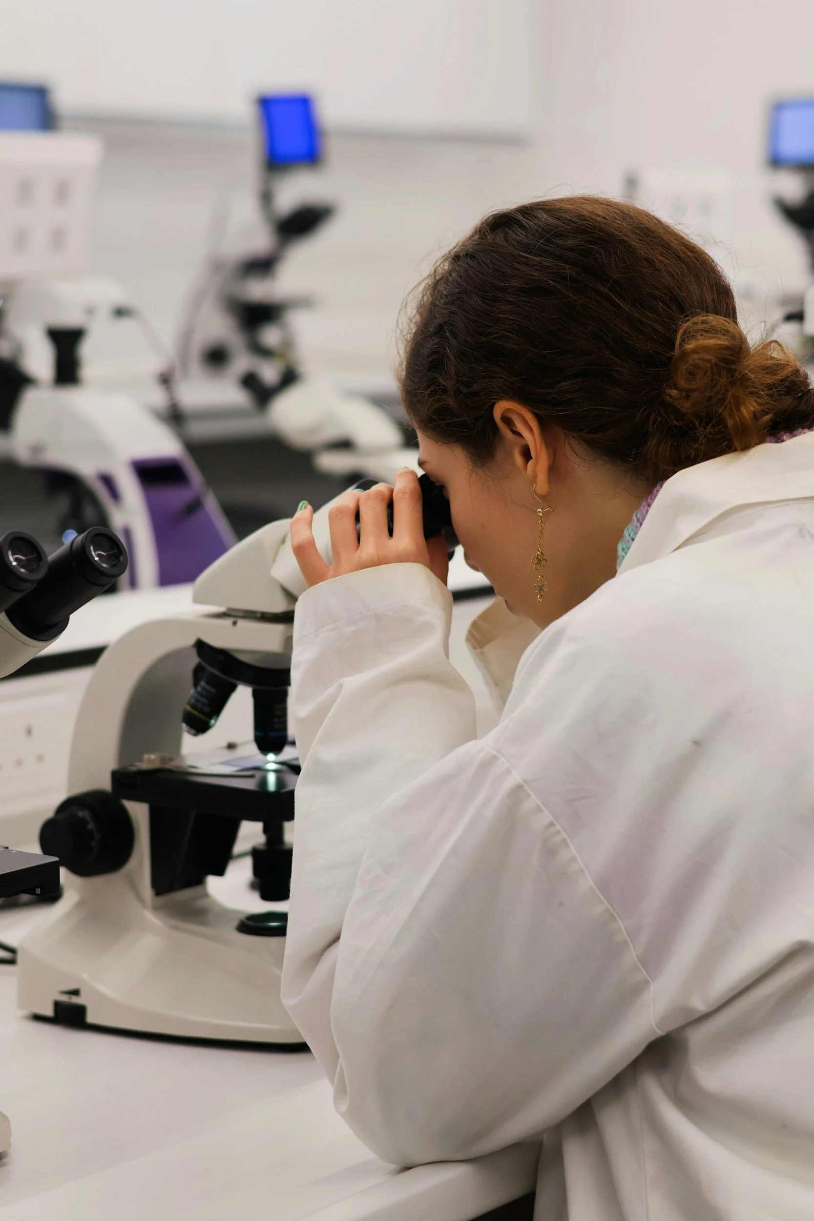 Biologist inspecting strains of probiotics