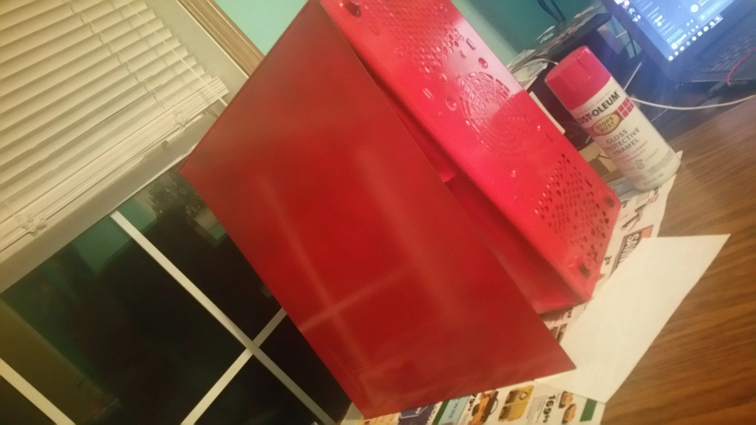 Painted red.  Used masking tape on the inside to keep the red from bleedinginto the case to allow for clean red/black contrast.