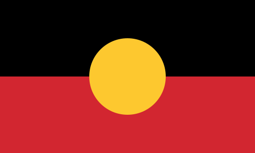 Flag with a yellow circle in the middle. The flag has two halves - a black top half and red bottom half.
