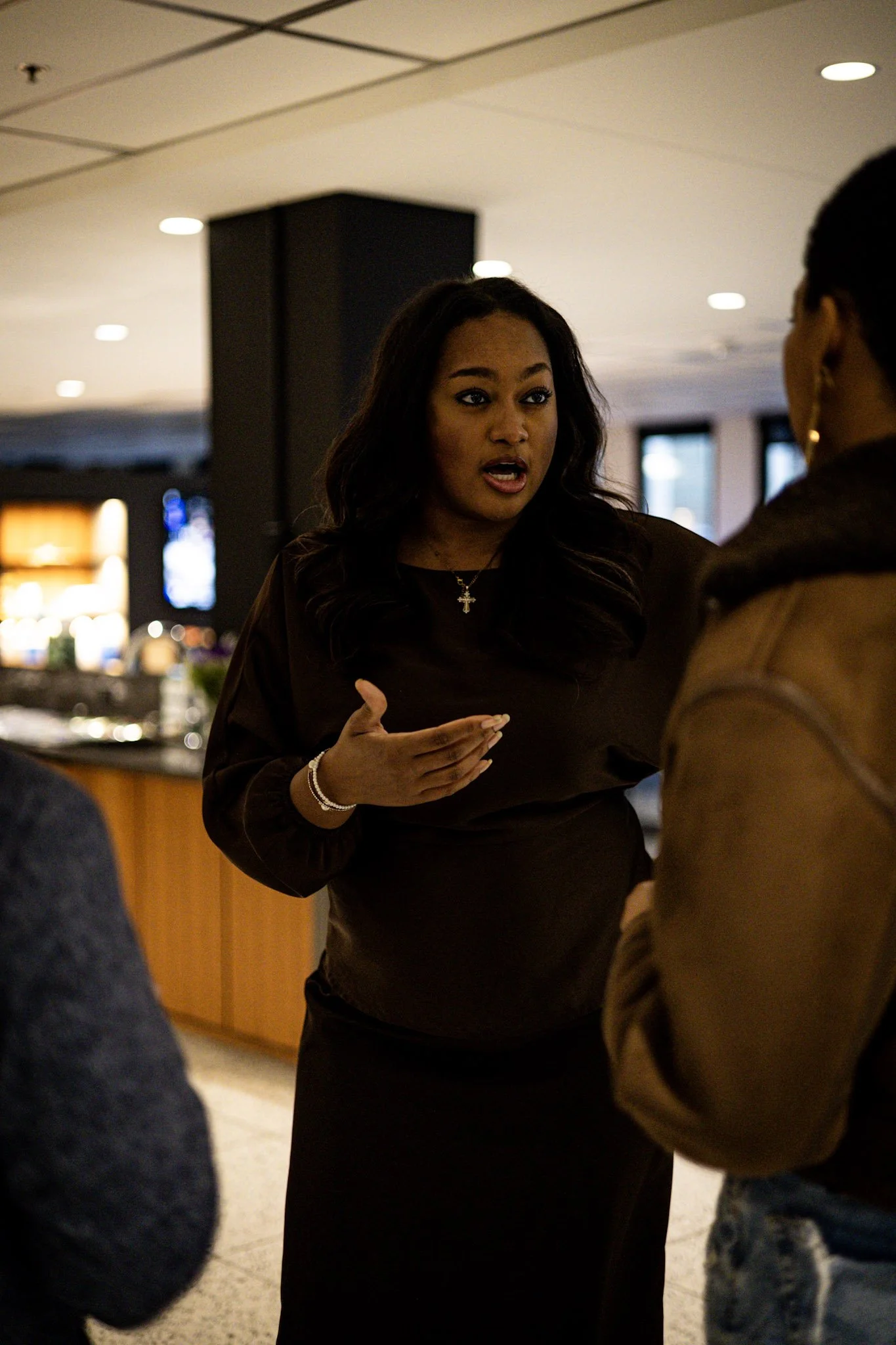 Young Black woman in leadership advancing policy and community development in Minneapolis through Victory of the People. Community organizer leading civic engagement efforts to strengthen economic participation in Minnesota with Victory of the People