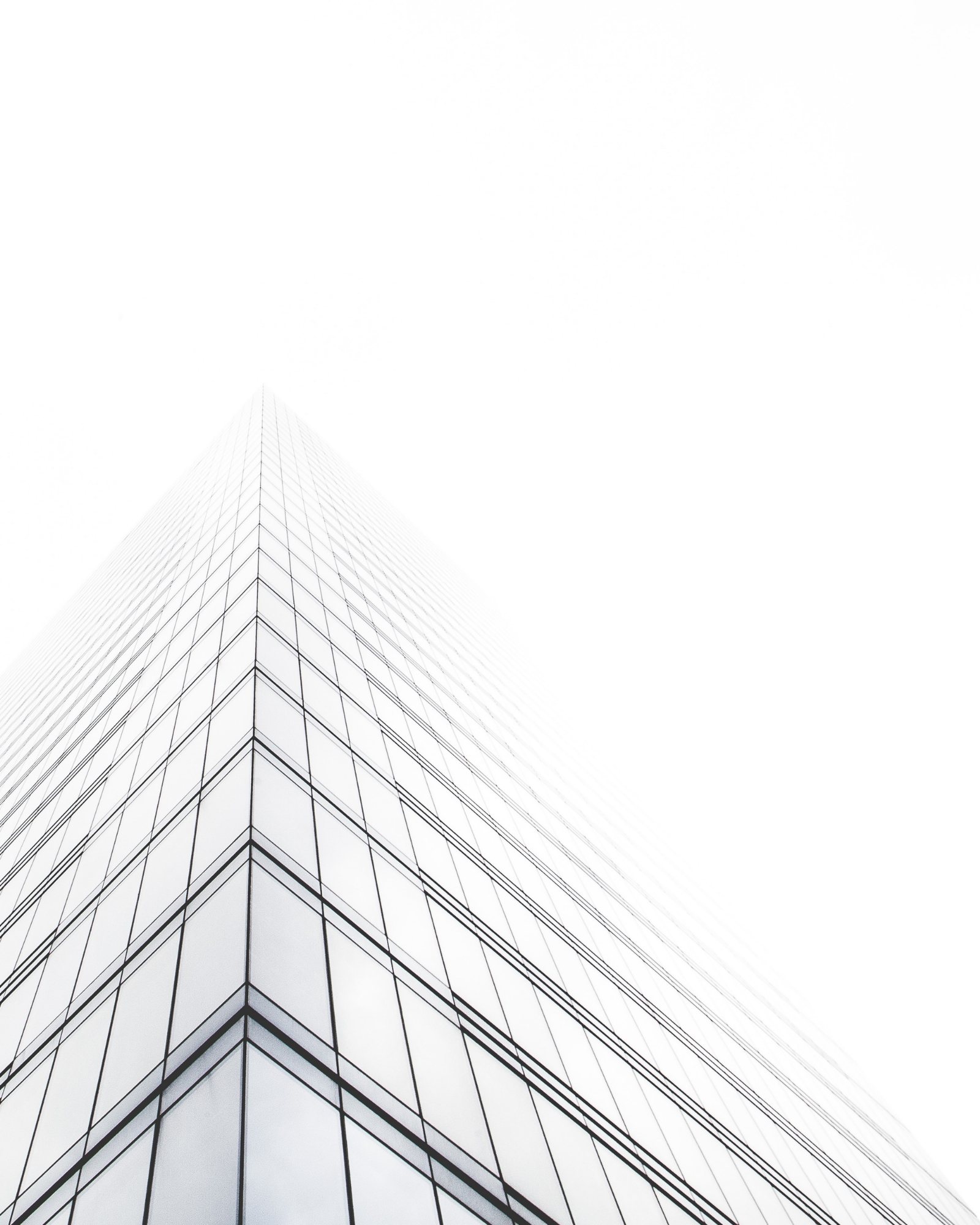 Modern corporate building representing trademark support and intellectual property services. Corporate office building representing trademark support, brand protection, and intellectual property solutions