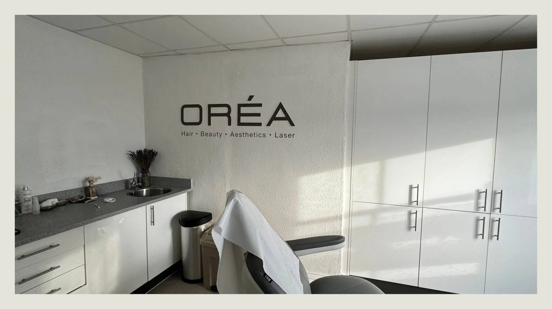 OREA-Salon-wall-graphic-in-treatment-room-at-new-clinic-scaled.jpg