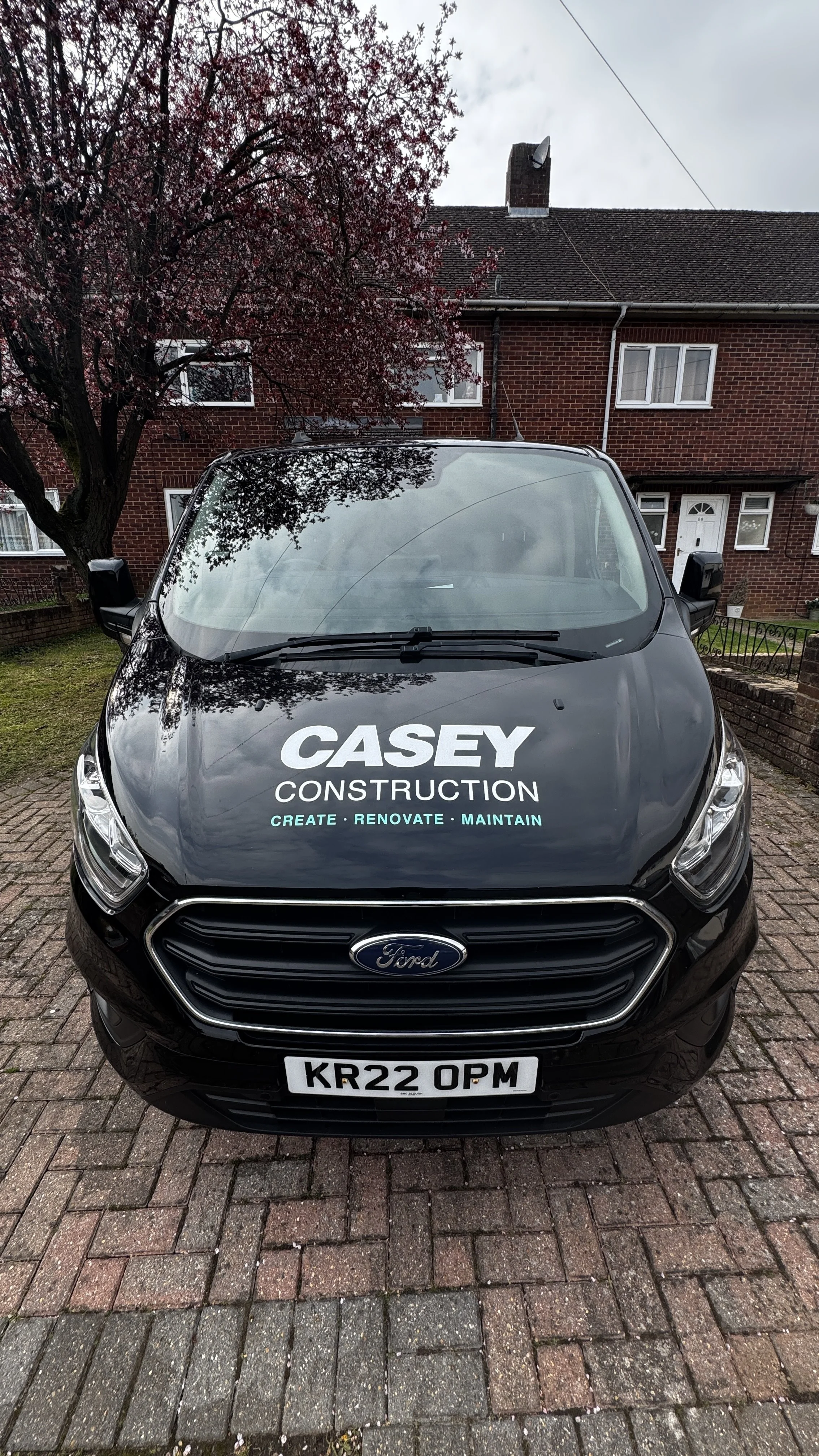 Casey Construction Van signage graphics installed front bonnet.jpg
