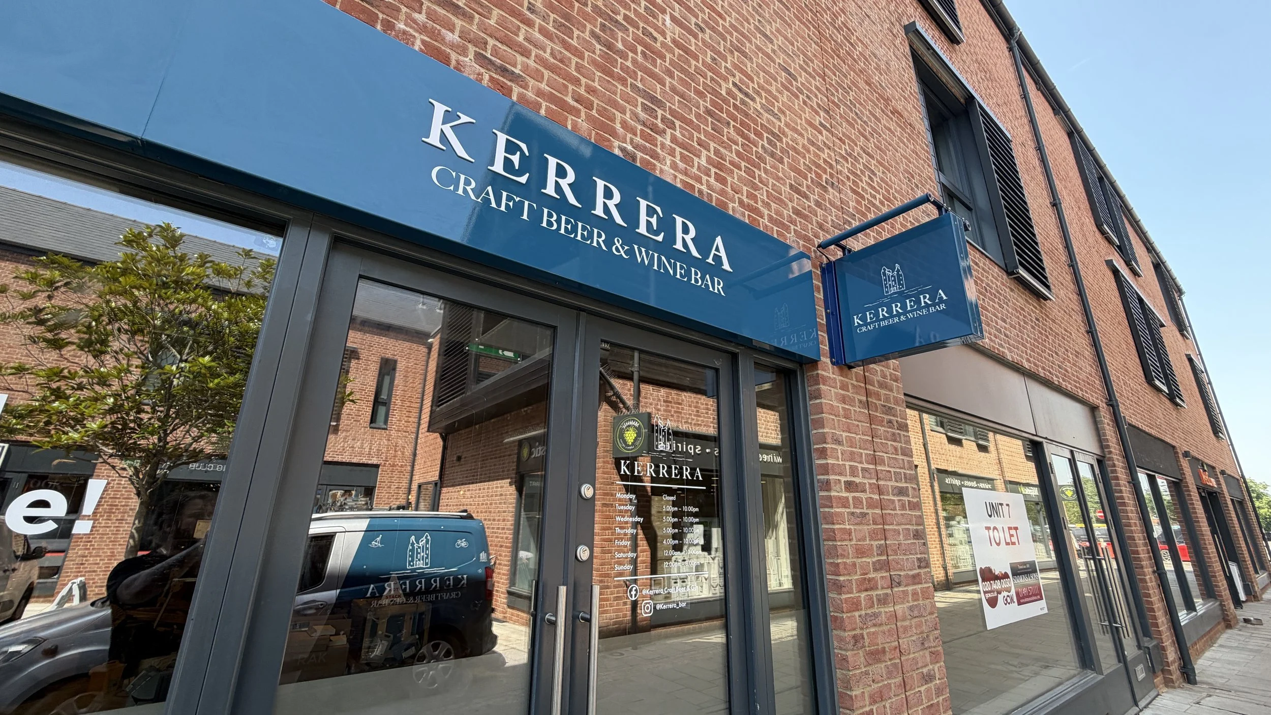 Window graphics: Opening hours and branded window decals for Kerrera Craft Beer and Wine Bar