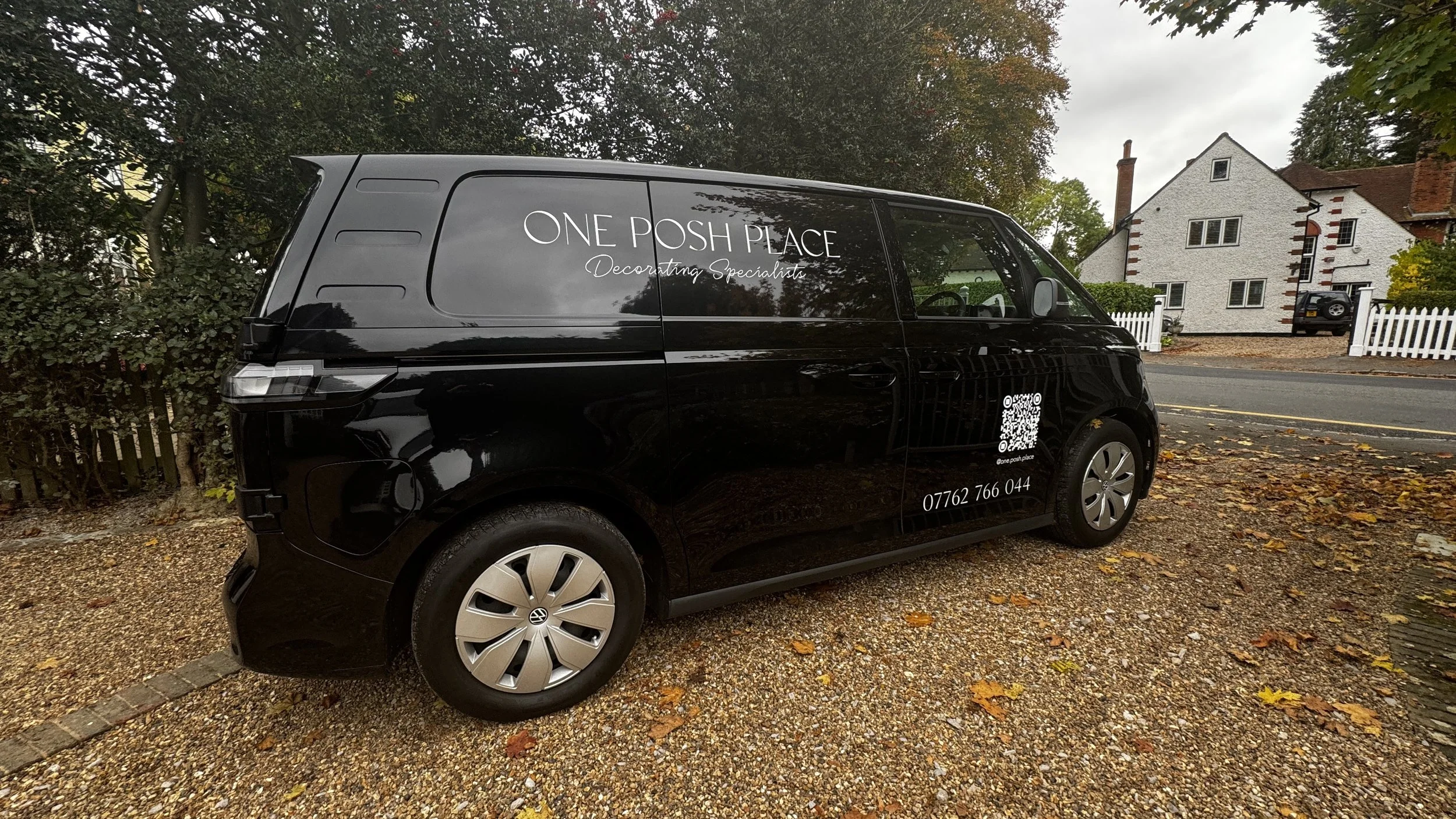 Completed VW ID. Buzz van branding with One Posh Place logo and contact details.JPG