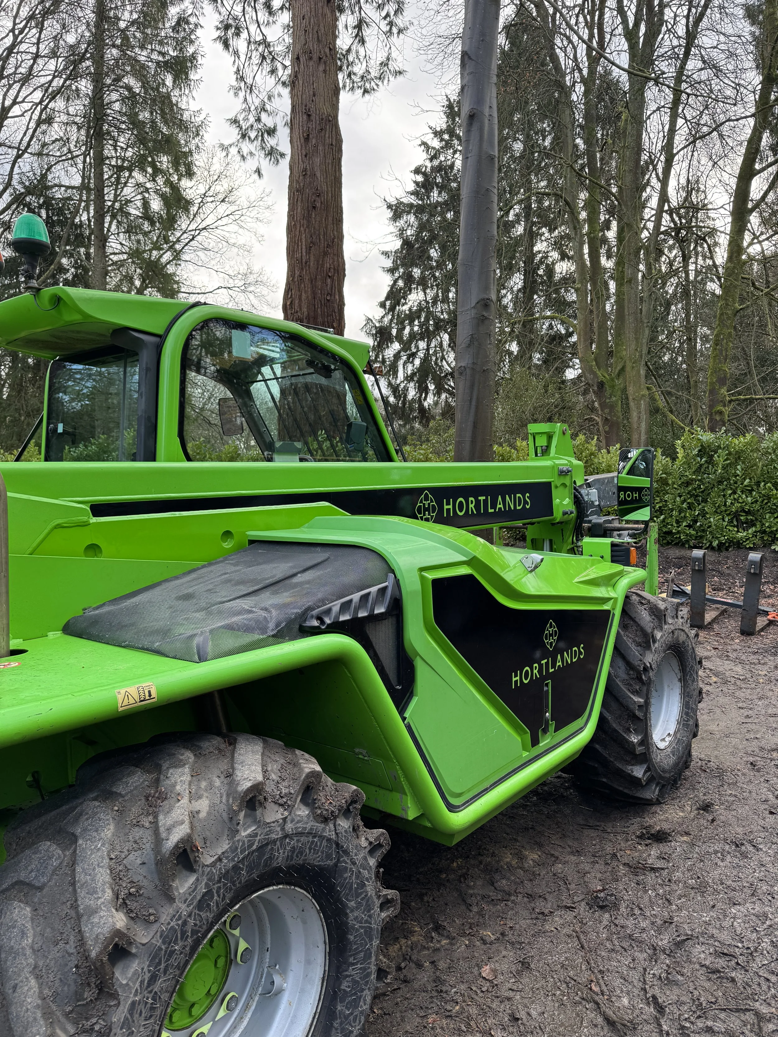 Close-up of precision-fitted Hortlands branding on specialist landscaping machinery.JPG