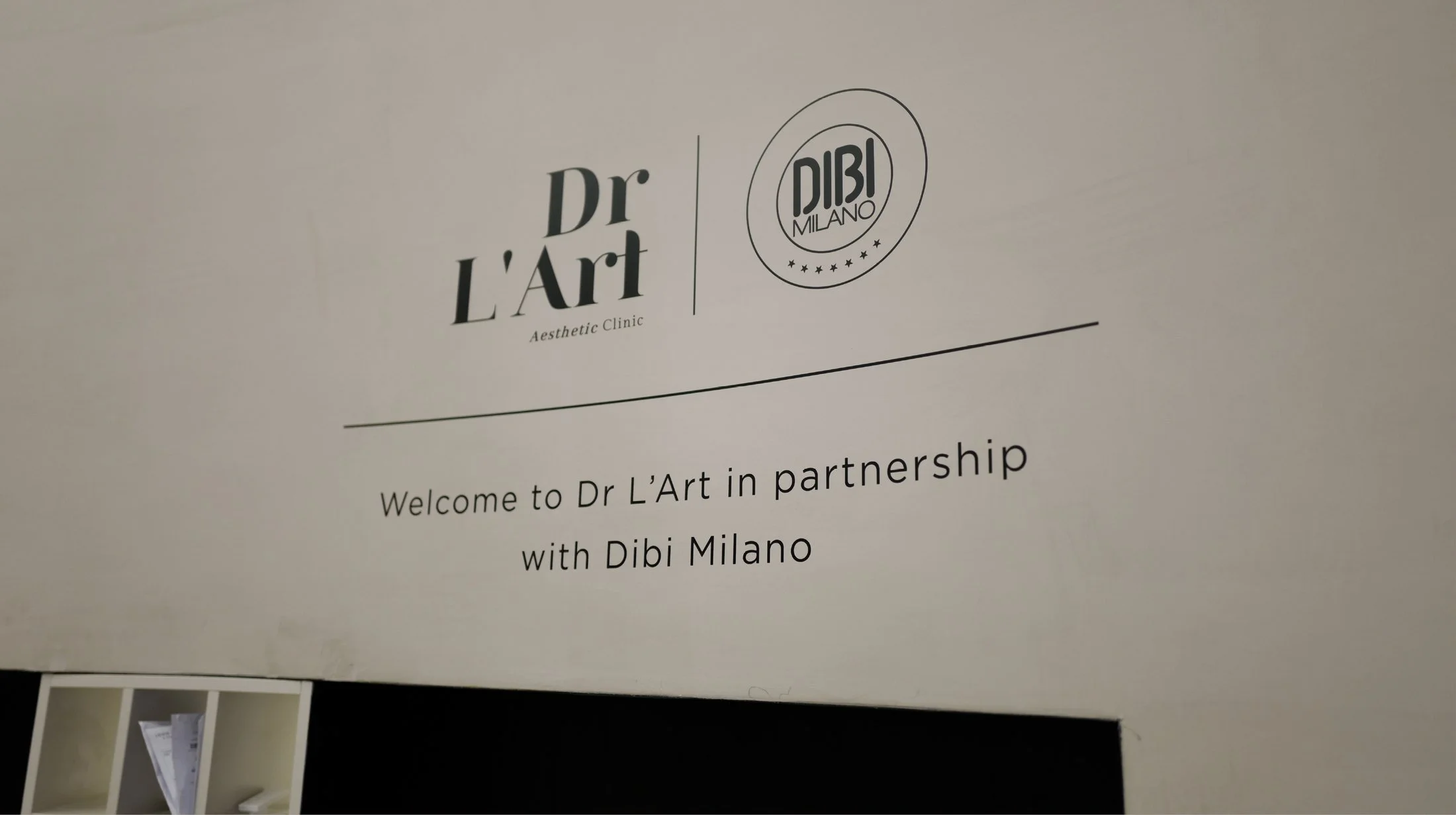 Dr-LArt-Oxford-street-clinic-reception-area-vinyl-graphic-messaging.jpg
