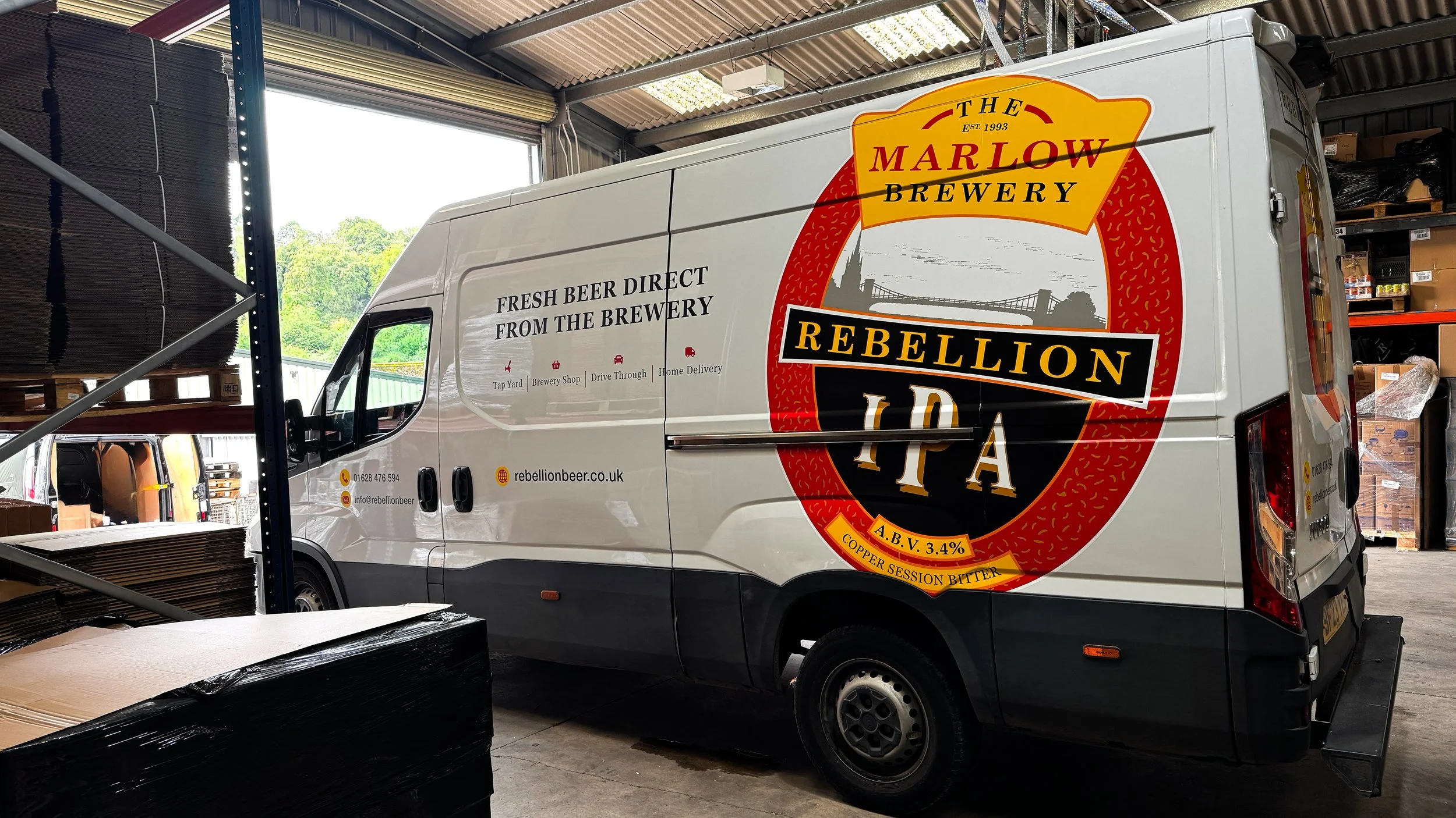 Rebellion Beer Van in Marlow brewary in warehouse signage graphics.jpg