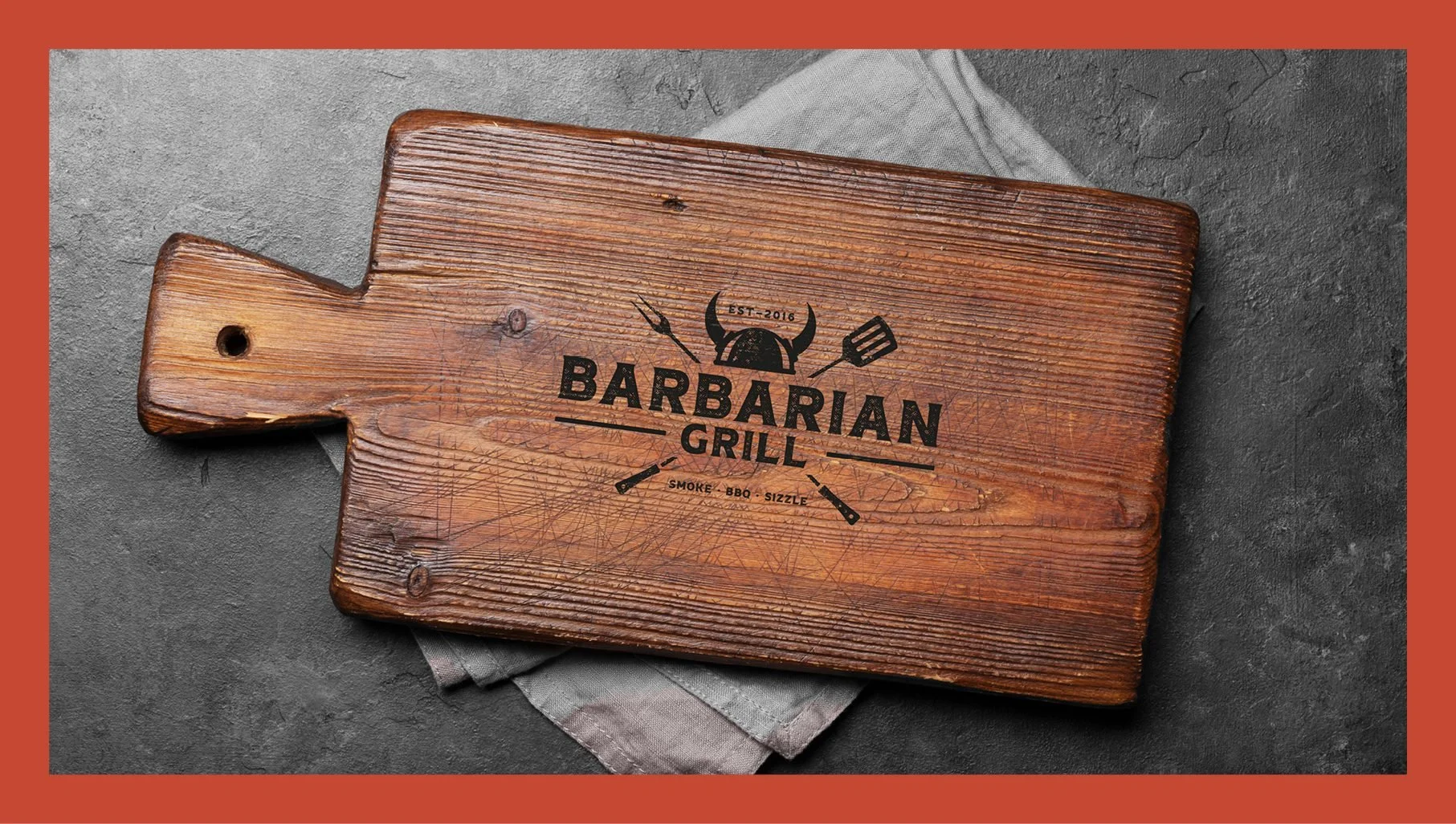Custom branded wooden board for the Barbarian Grill rebrand by Toy Creative