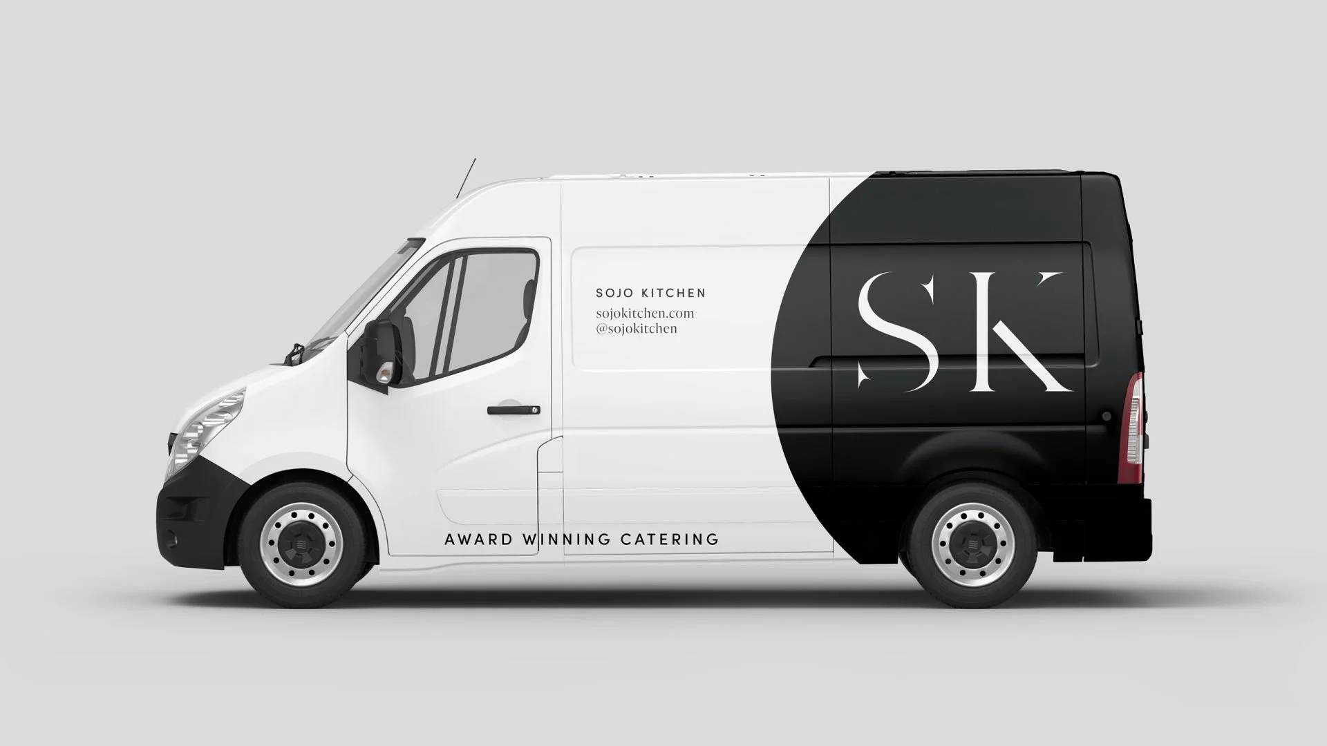 SOJO Kitchen catering van with matte black half-wrap graphics