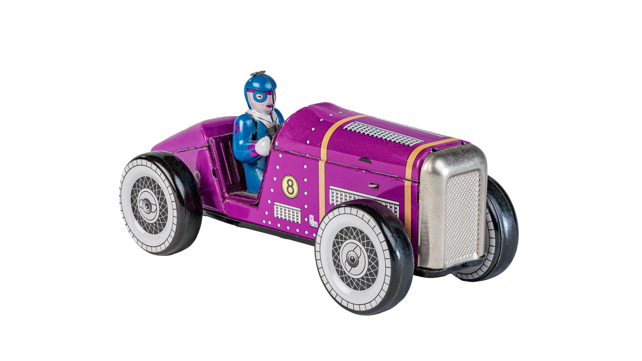 A vintage tin toy race car painted purple with a small blue and white driver figurine inside, featuring black wheels with white spokes.