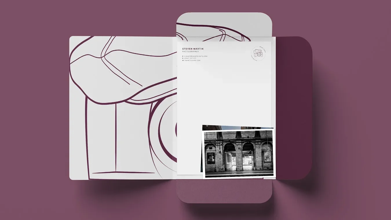 Printed-photography-folder-designed-as-part-of-photographers-branding.webp