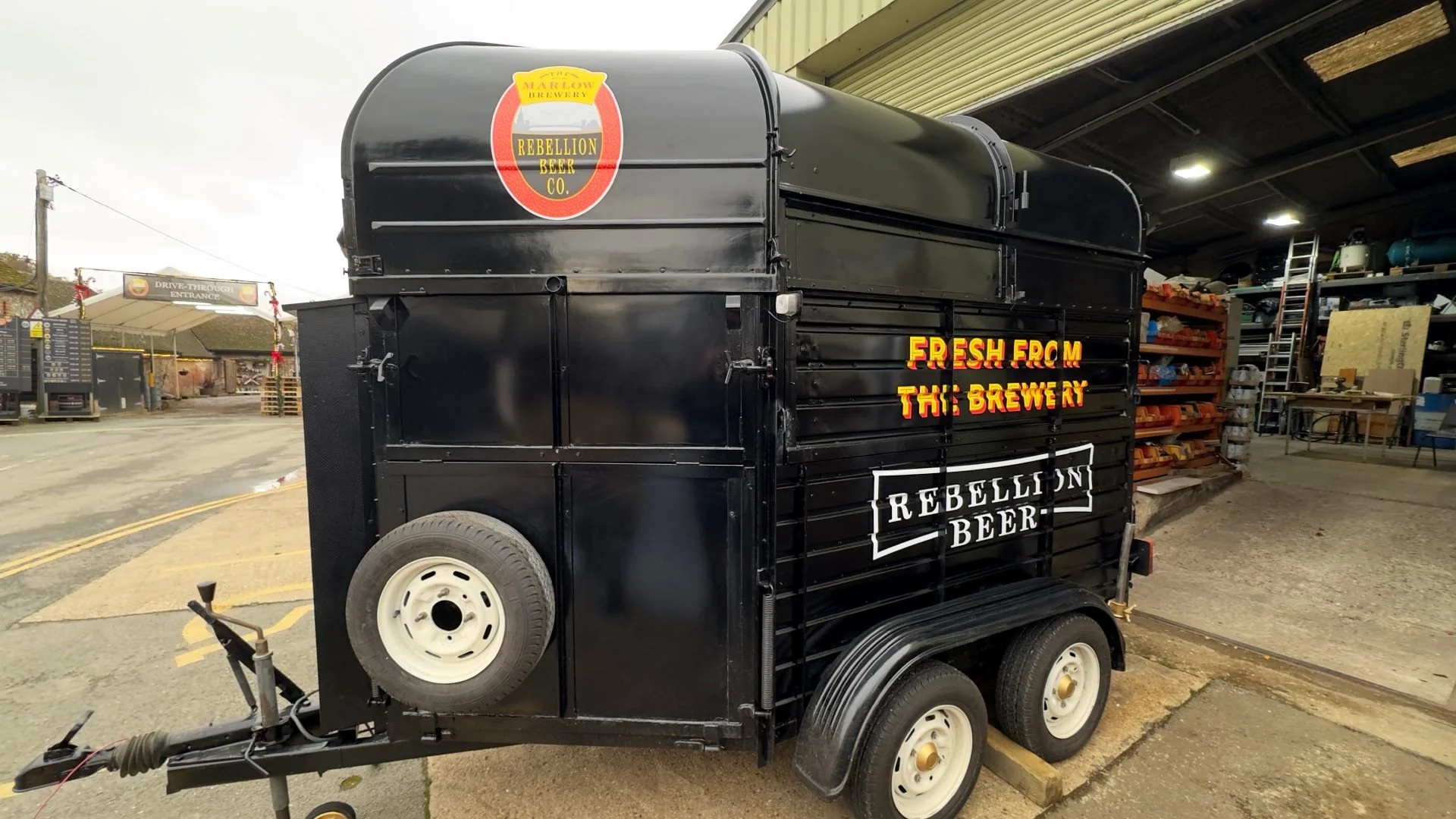 A-side-view-of-the-graphics-and-design-installed-for-the-horsebox-at-rebellion-brewary.jpg-scaled.jpg