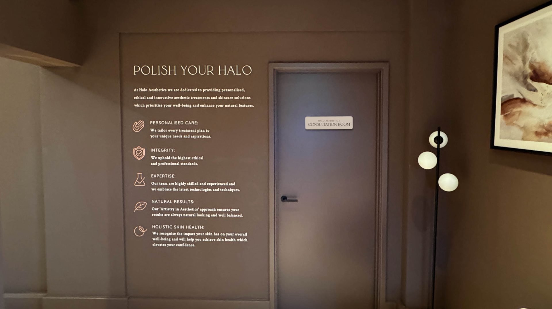 Halo-Aesthetics-Wall-graphics-and-door-plaque-scaled.jpg