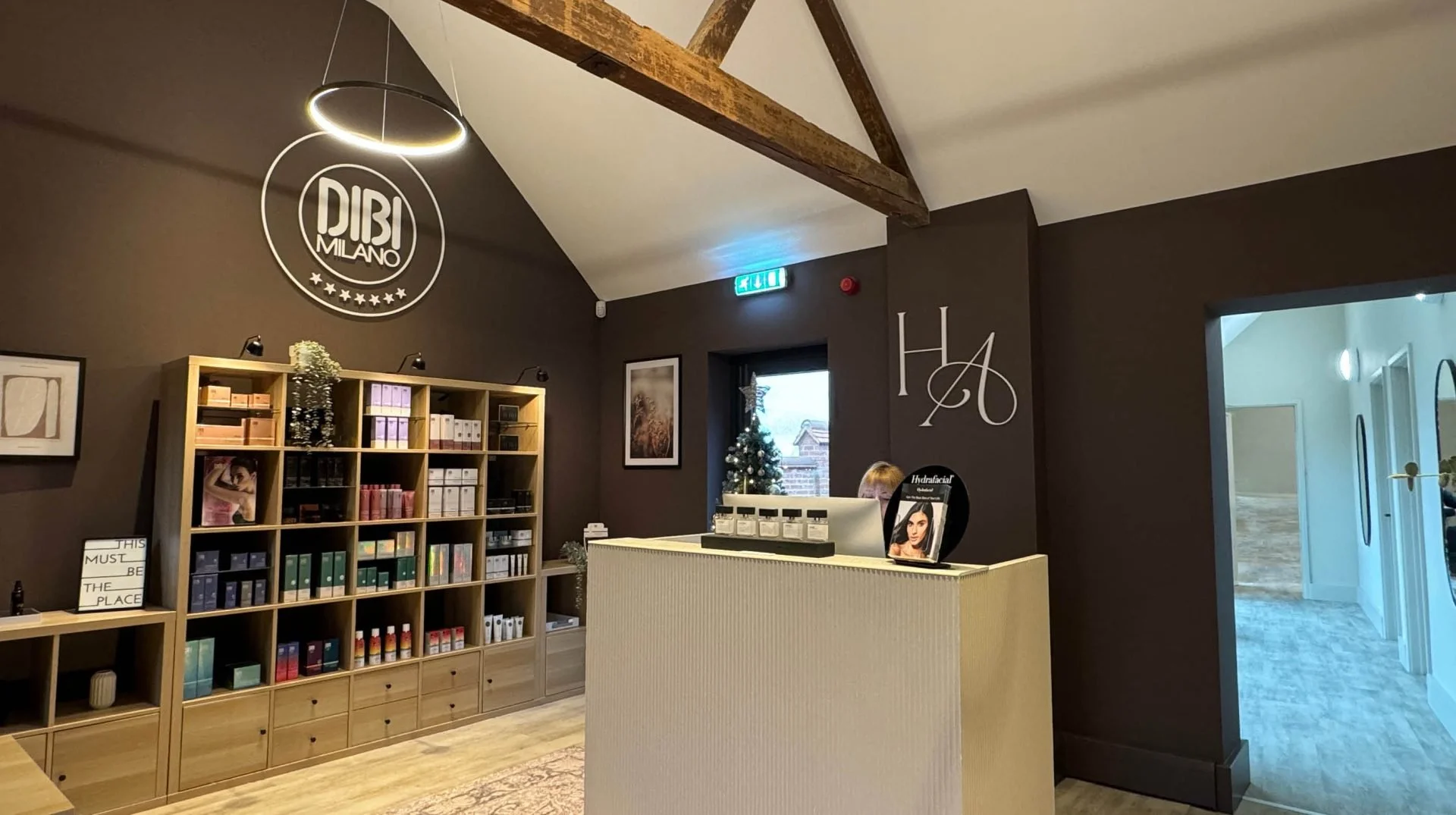 Halo-Aesthetics-reception-area-signage-and-printed-brand-pieces-1-scaled.jpg